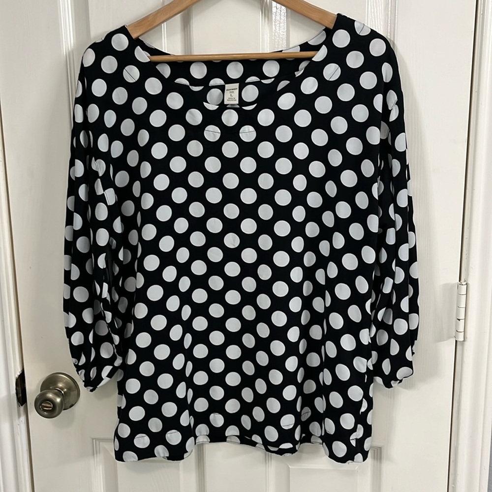 Black and white polka dot blouse.